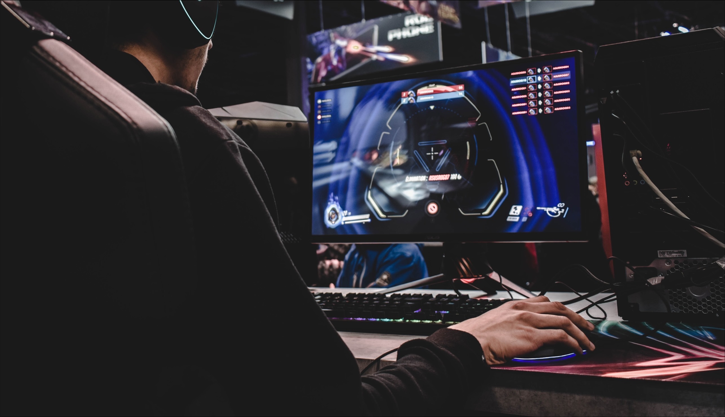 Person playing esports on computer.