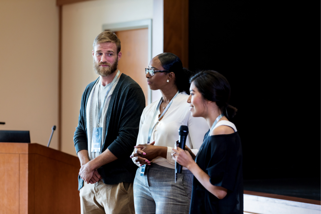 Three speakers present information
