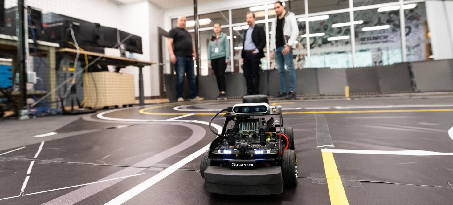 Autonomous test vehicle in laboratory enclosure.
