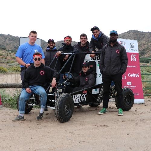 Students showcasing their vehicle project.