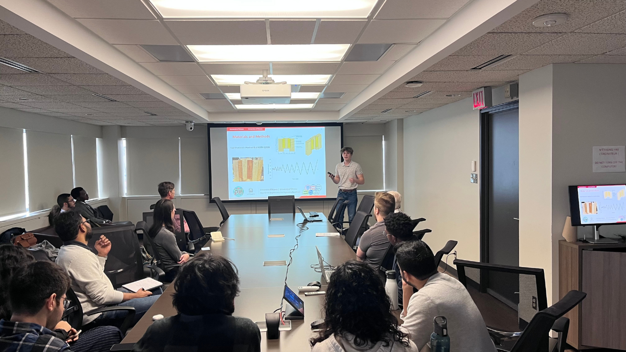 Student presenting their research to an audience