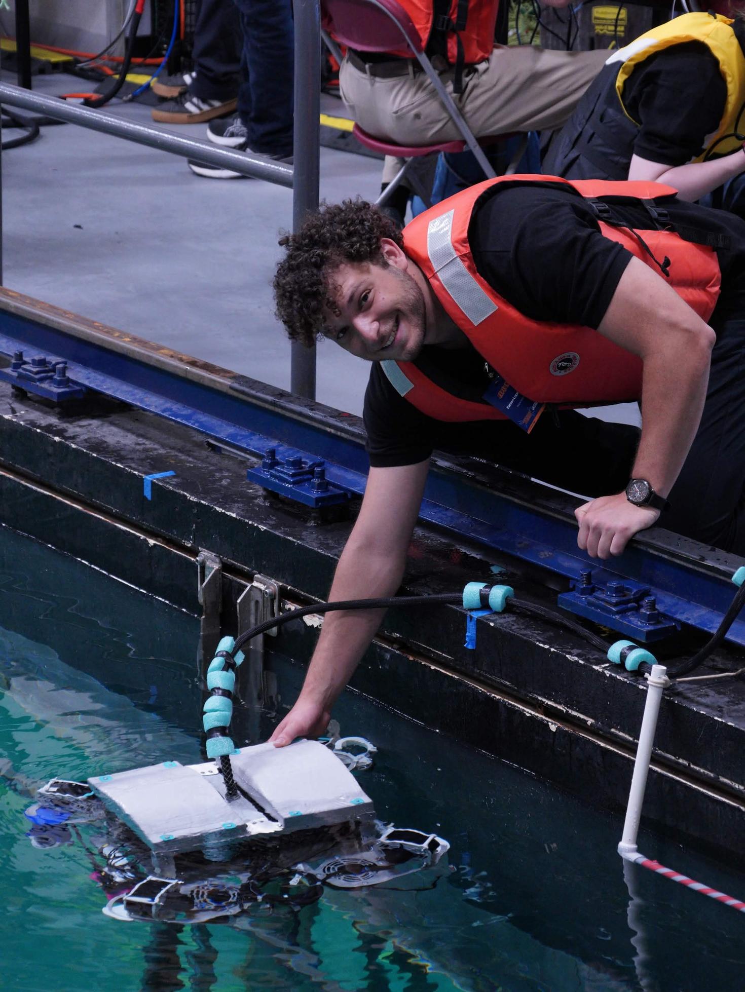 One member of Kelpie's team with their robot