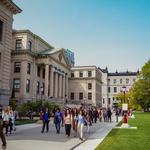 Tabaret Hall with students walking in front.