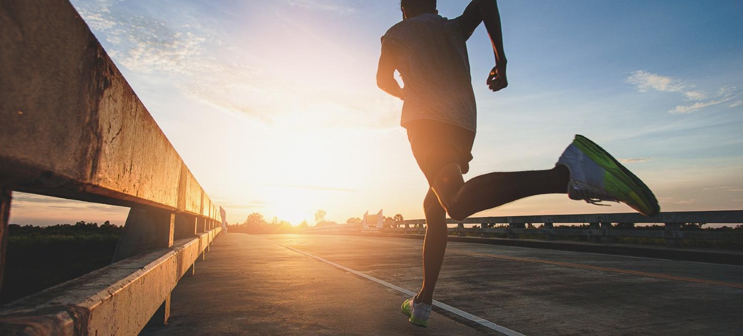 Athlete runner feet running on road, Jogging at outdoors