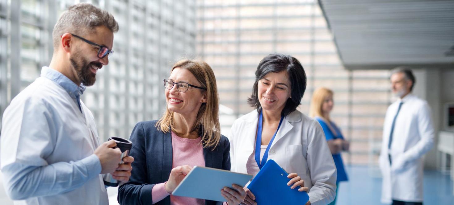 Health professional talking together