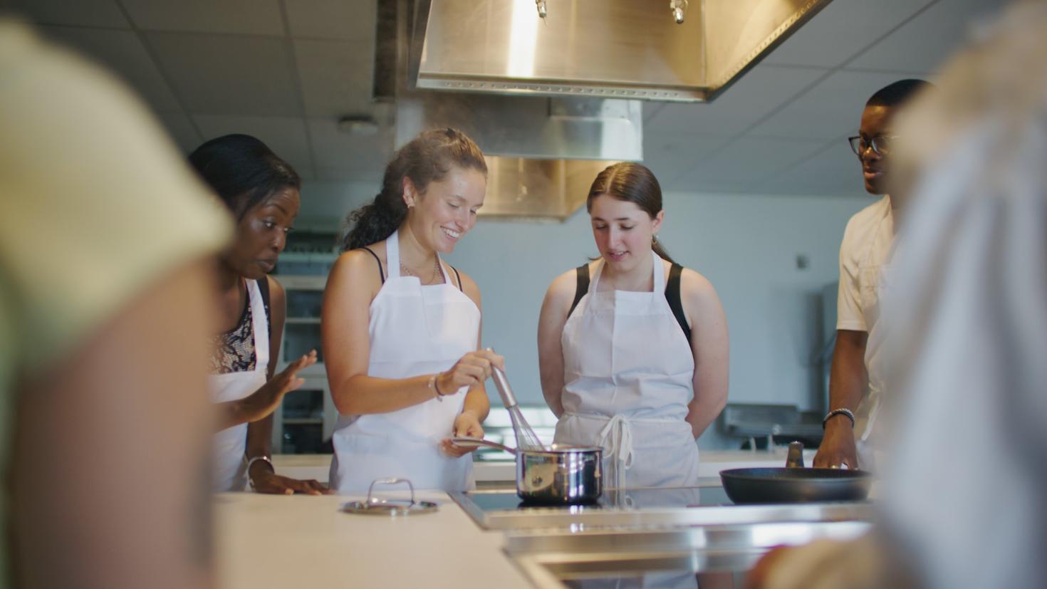 Students cooking in a kitchen