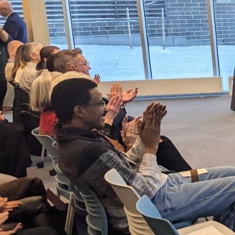 an audience applauding