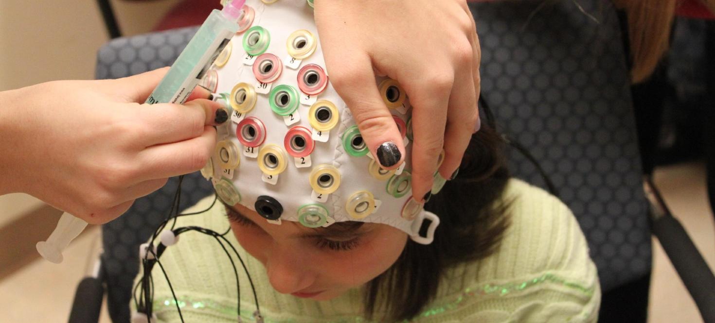 Young girl undergoing audiology exam