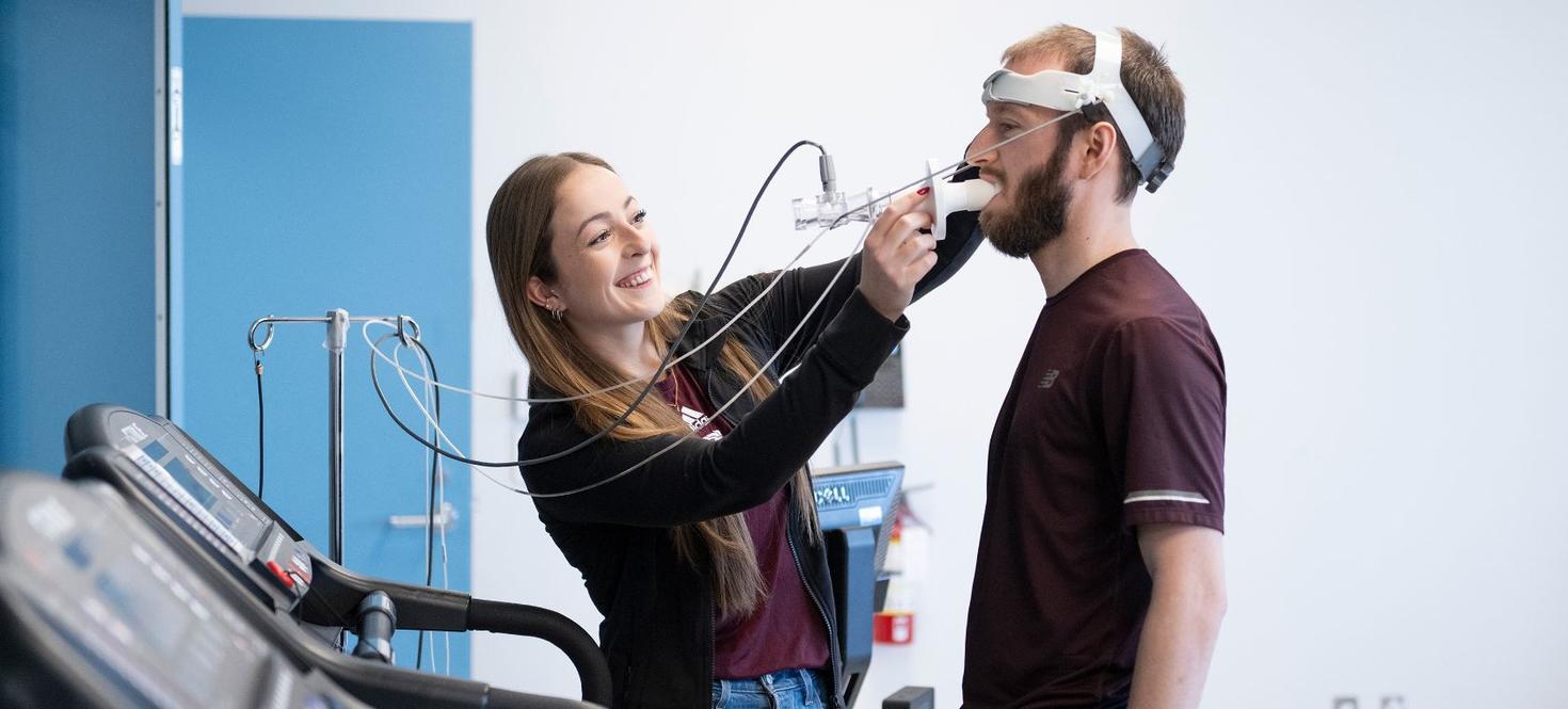 Research study participant undergoing lung function testing