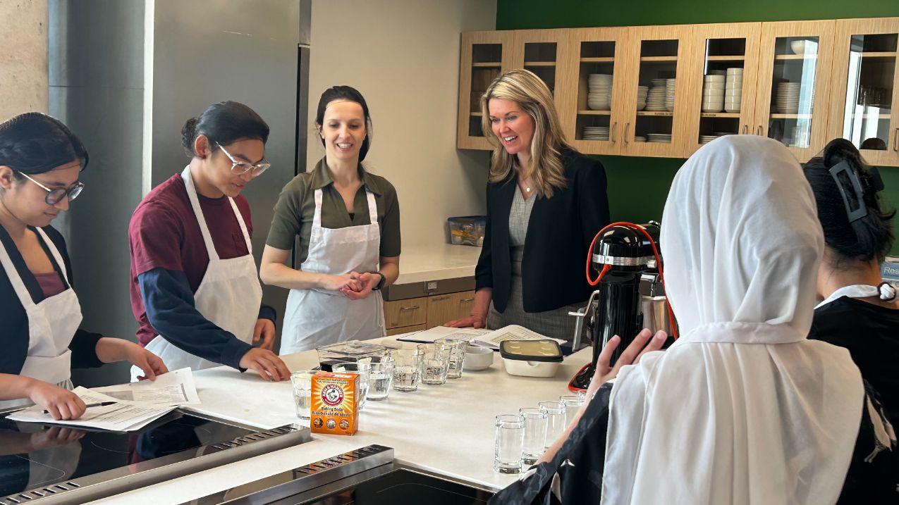 A group of students in a kitchen