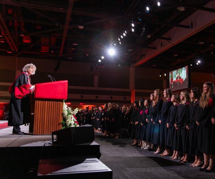 Dean Lucie Thibault at the lectern during Convocation ceremony