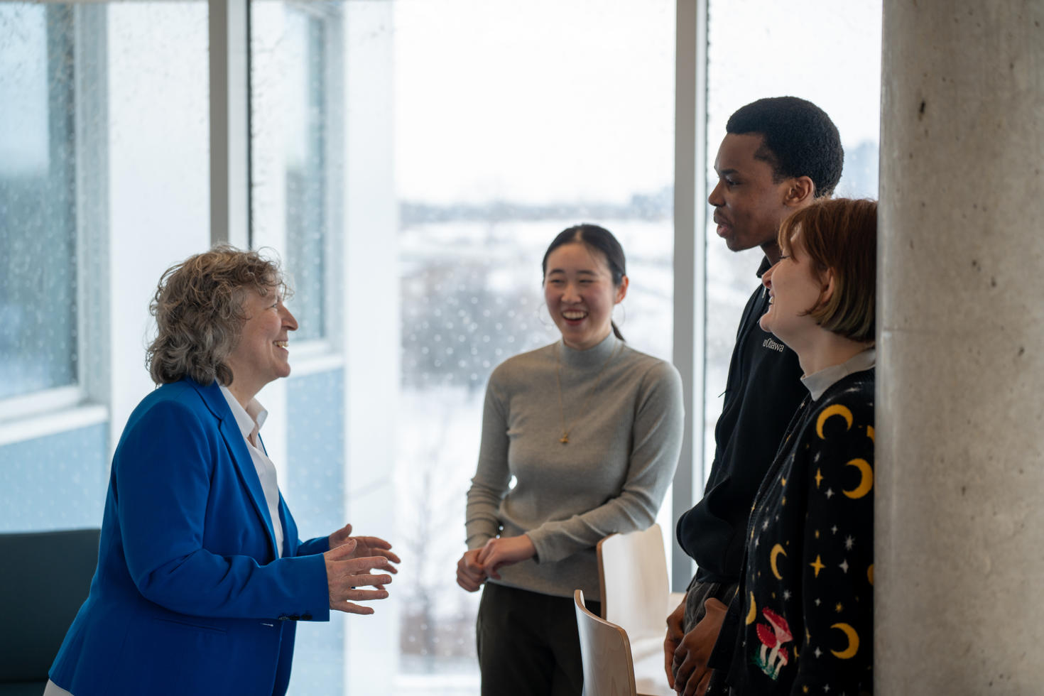 Dean Lucie Thibault with students