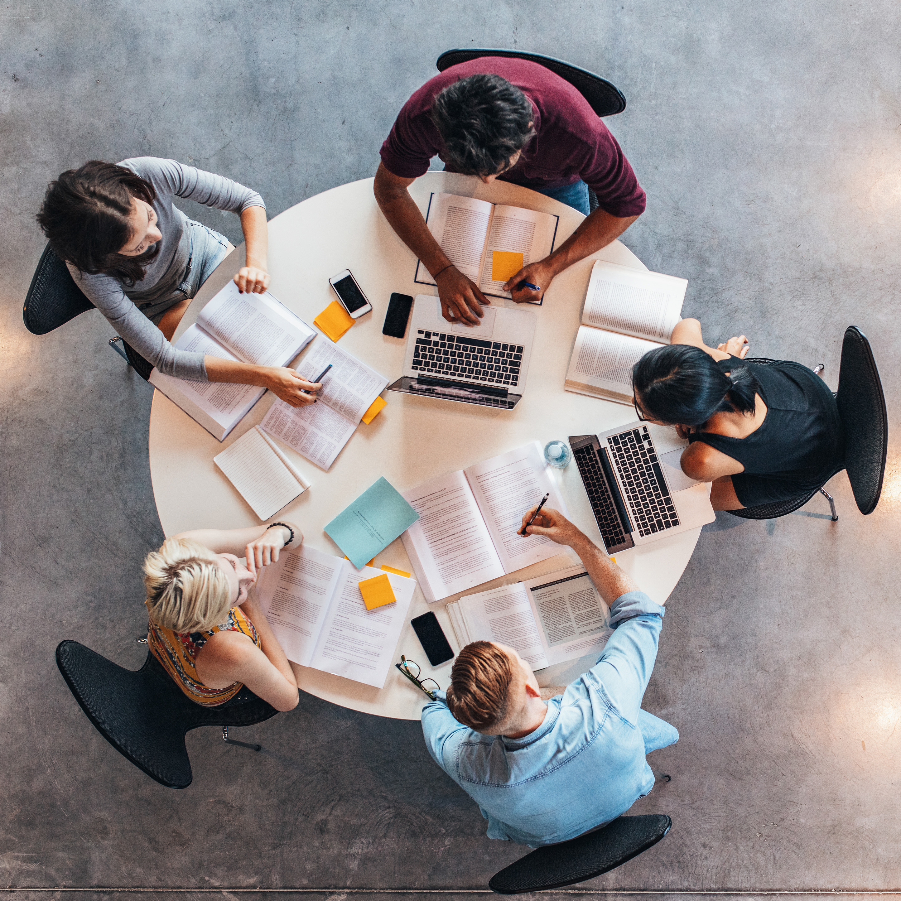 Students working on a round table