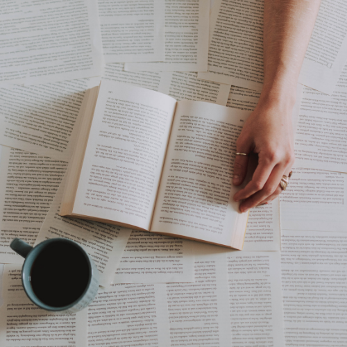 Person searching in various open books