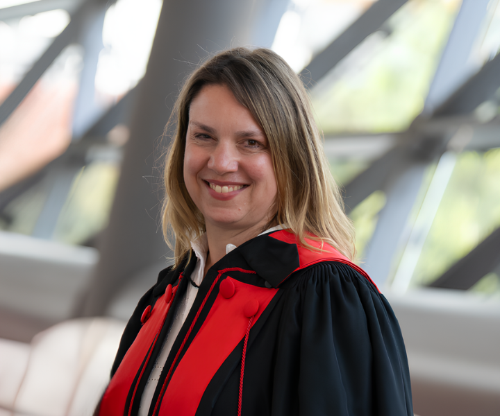 The dean, Kristen Boon, smiling at the camera