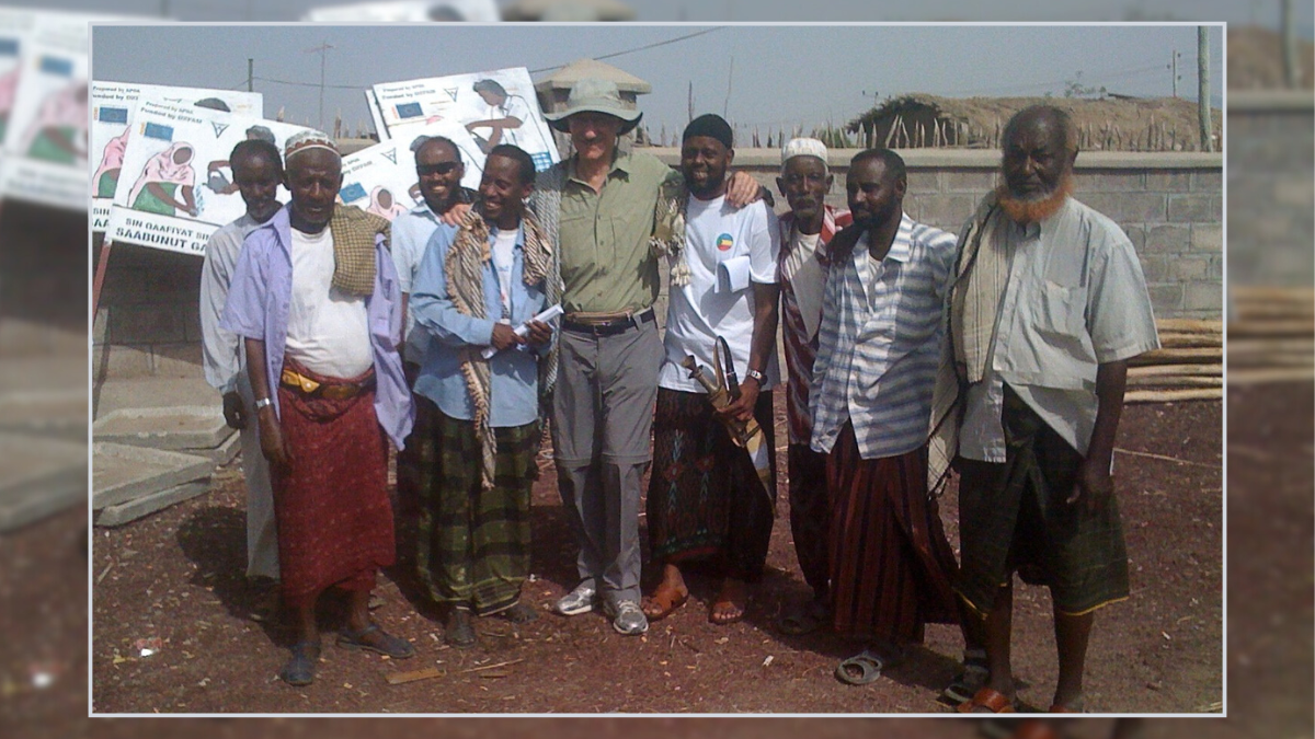 Professor Joseph Magnet with people in the Afar region