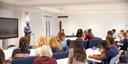 Teacher in front of a group of students
