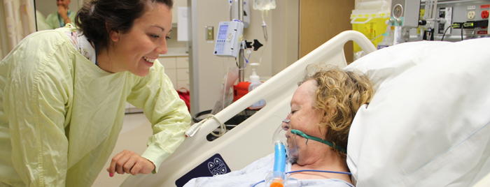 Student tending to a patient