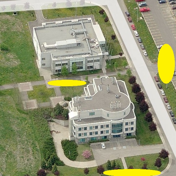 Aerial view of the Peter Morand Buildings showing evacuation areas north of Peter Morand Crescent, west of Roger Guindon Avenue, and between the two buildings.