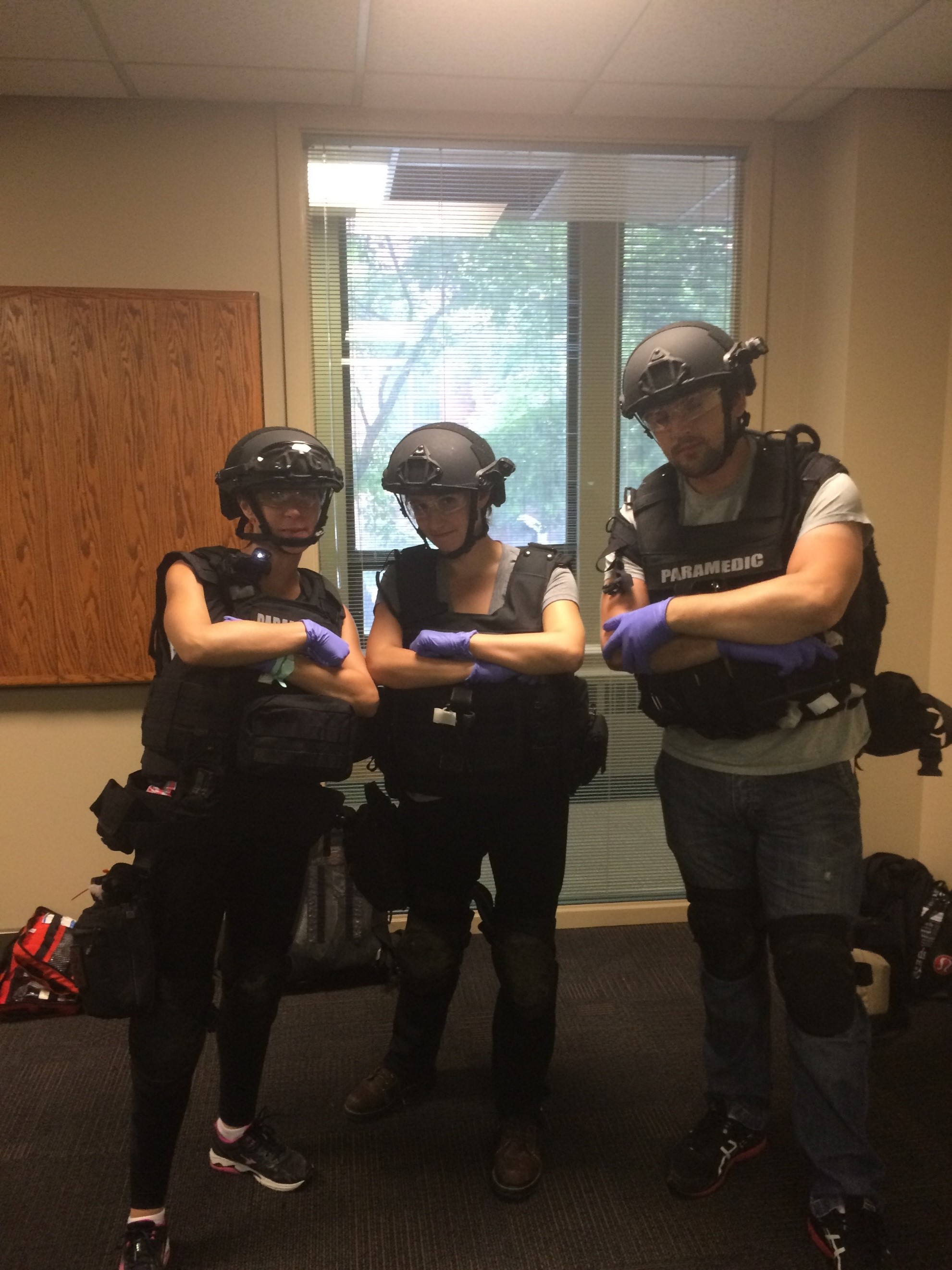 Three paramedics in tactical gear 1