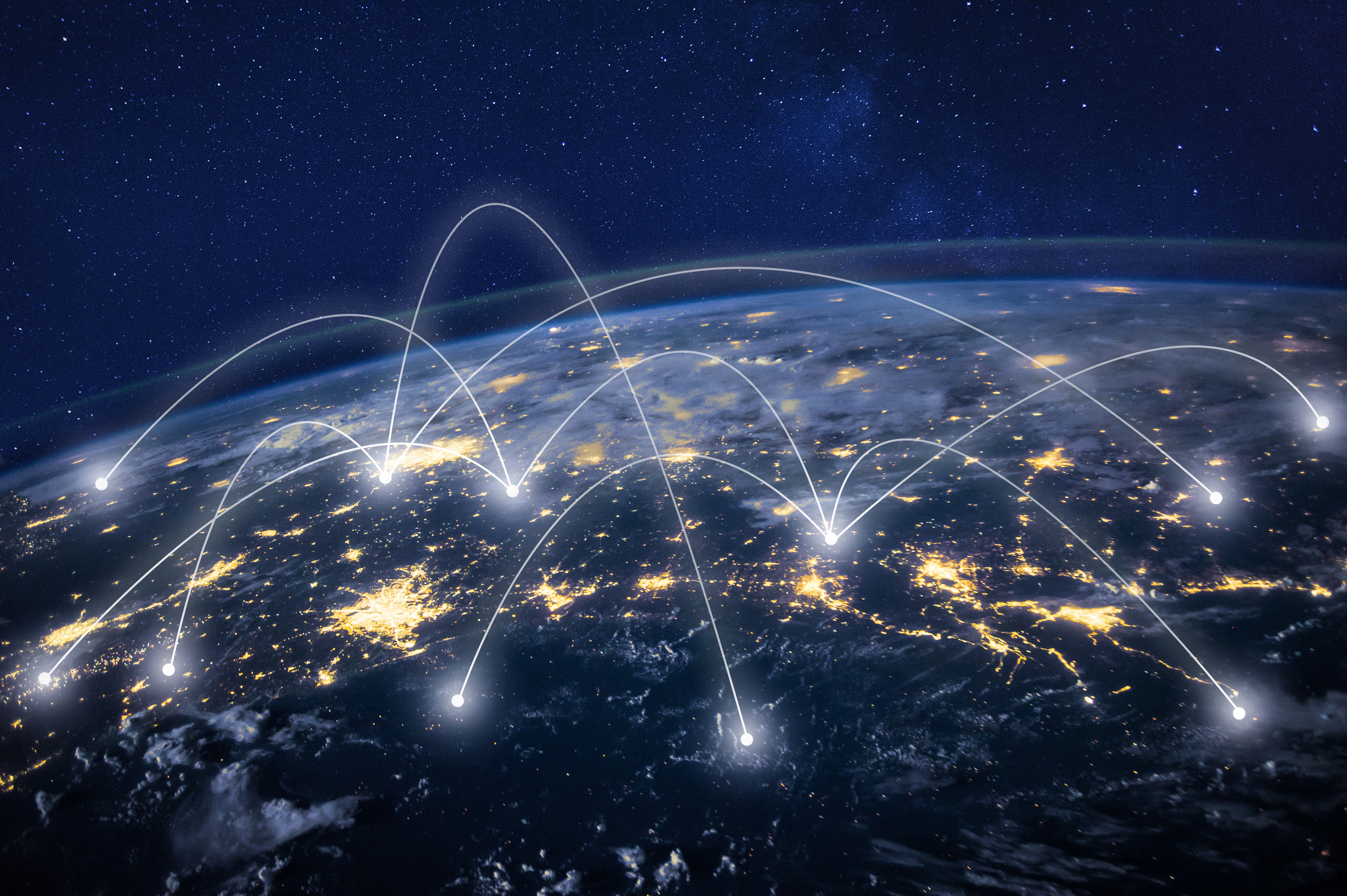 earth with lines of light connecting cities