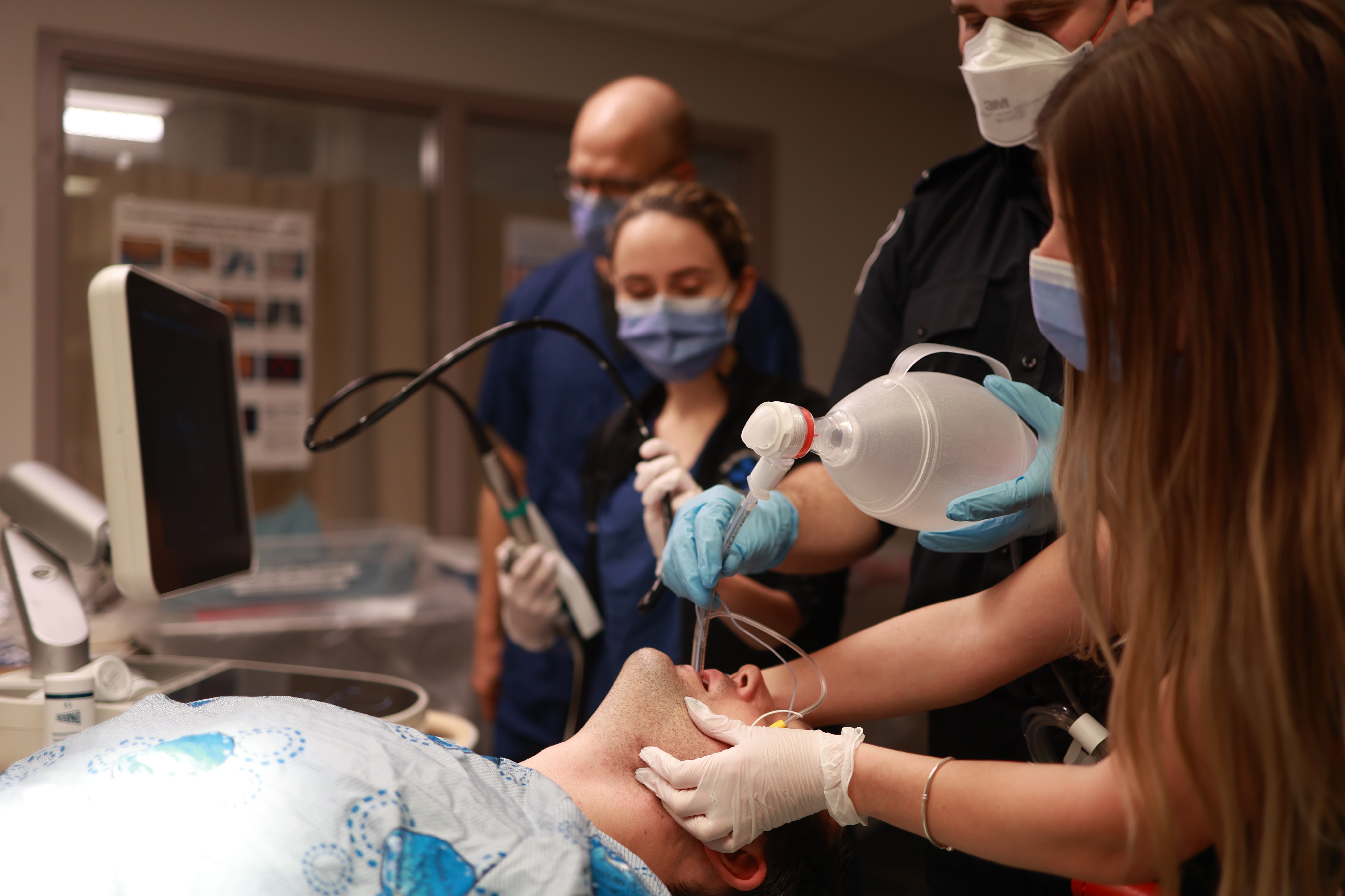 Patient being intubated by staff