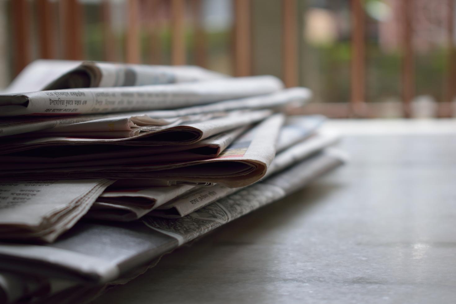 newspapaer kept on a table