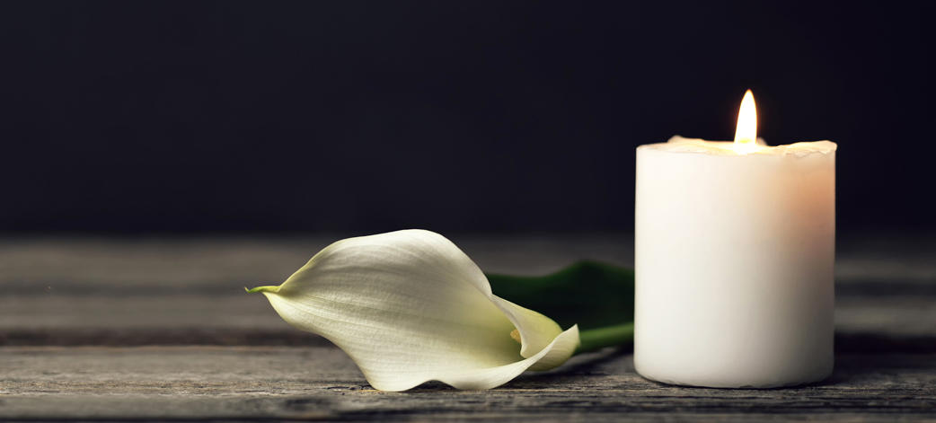 Burning memorial candle