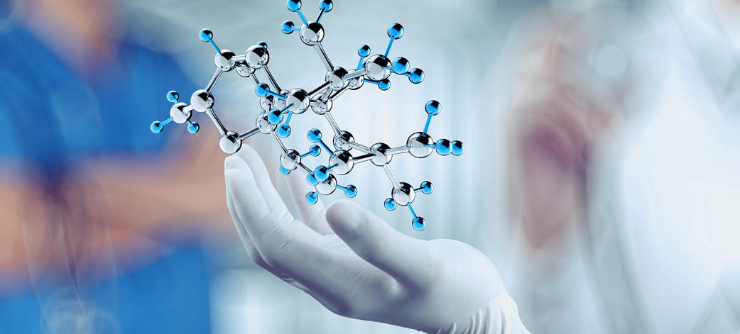 a gloved had holding a virtual cell chain