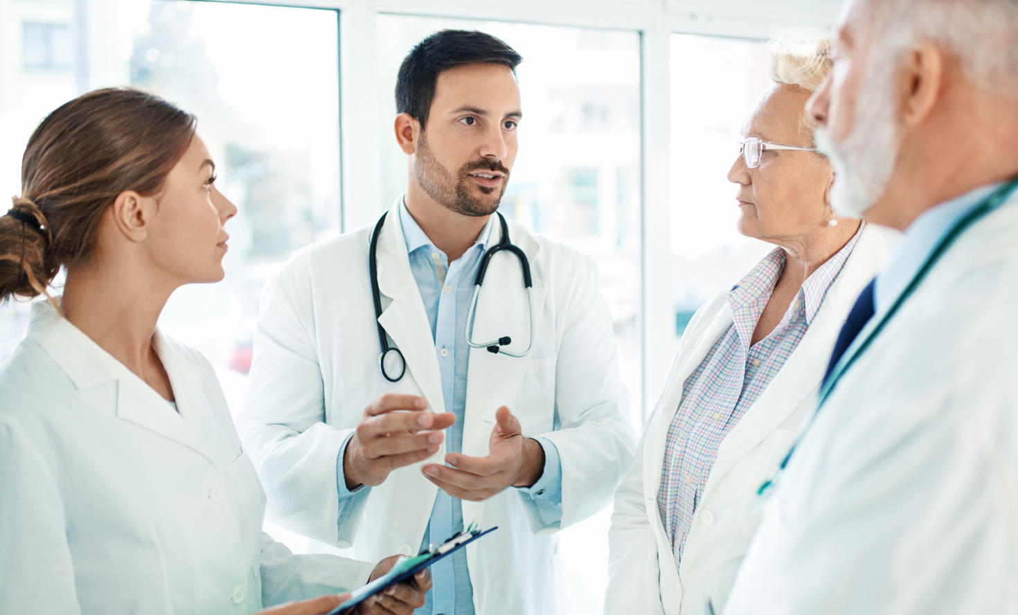 doctors in a meeting discussing with each other