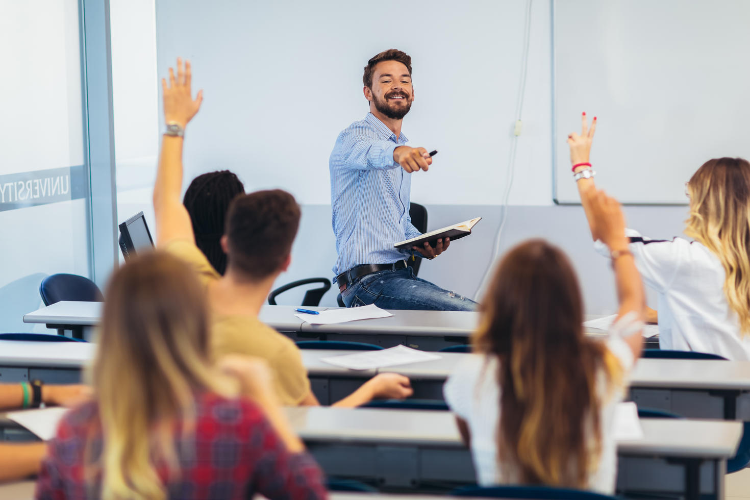 Professor answering questions from students