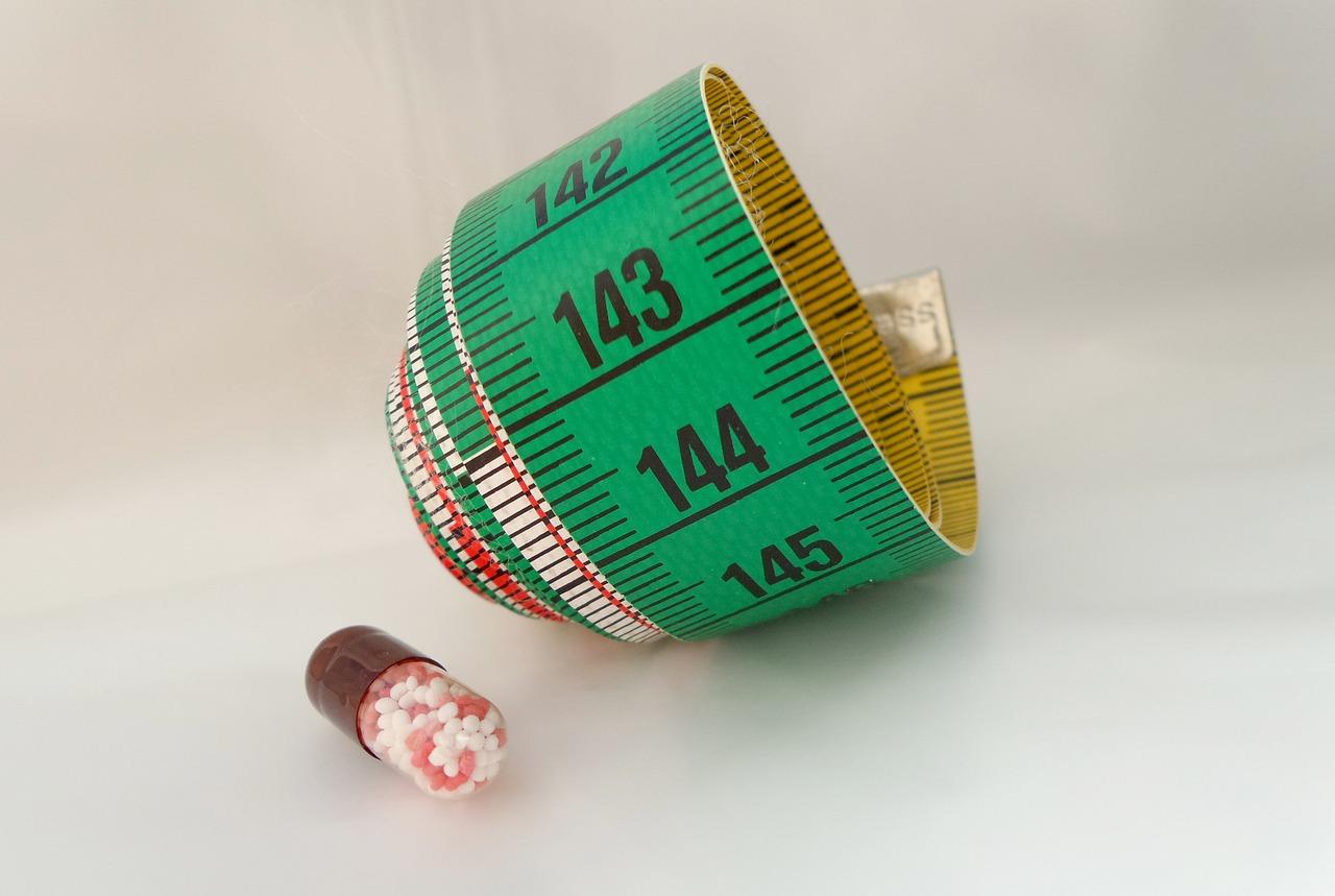 Soft measuring tape and pill