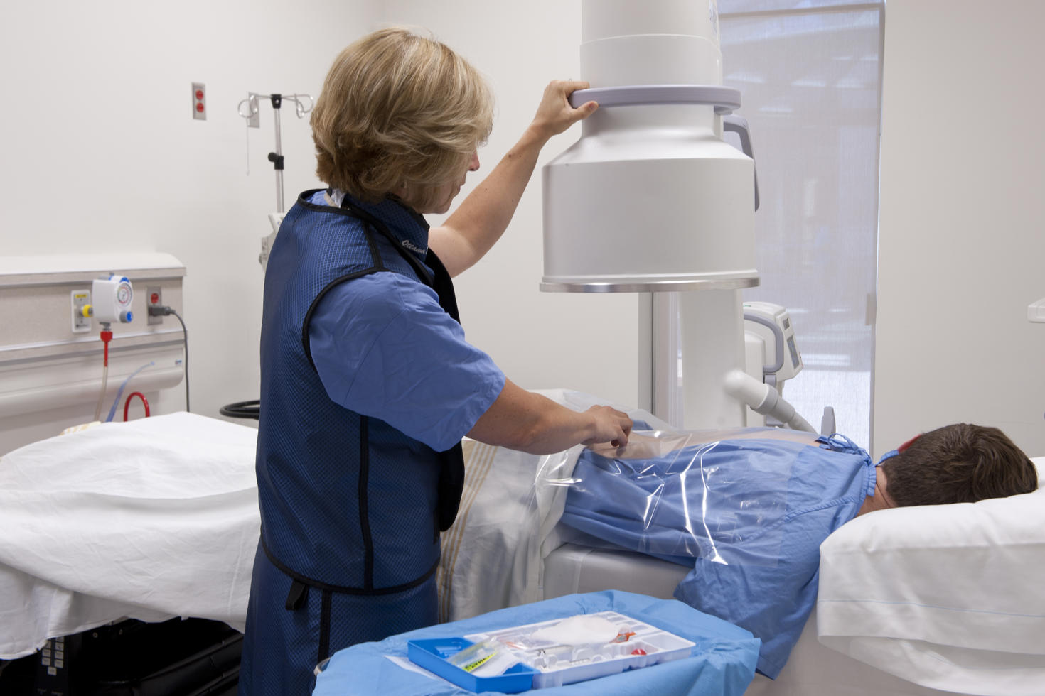 doctor performing back scan