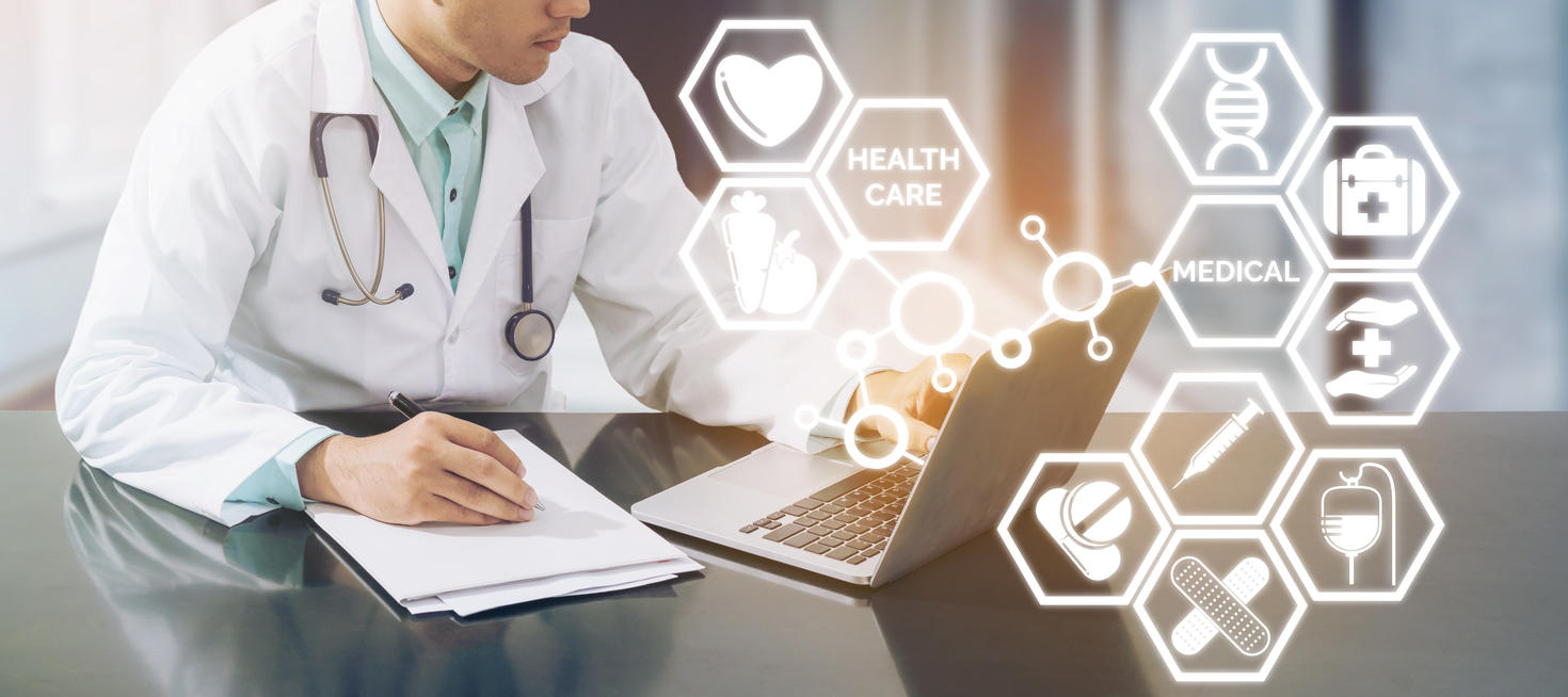 Doctor on Computer with Icons