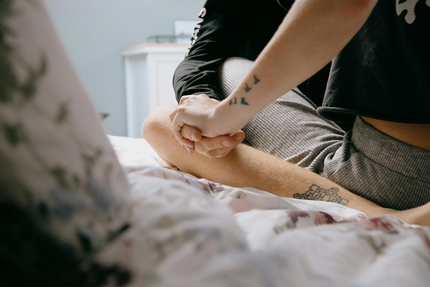 Couple holding hands