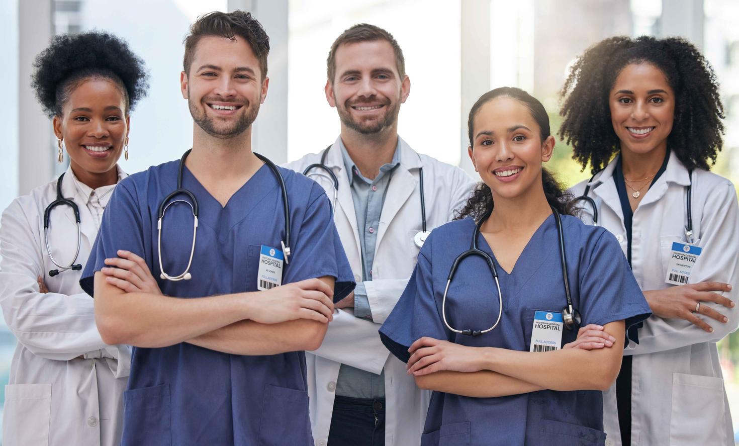 Portrait, nurses and doctors at hospital proud, empowered and excited about medical collaboration