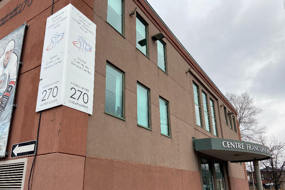 Building with a sign for the Vanier Community Service Centre.