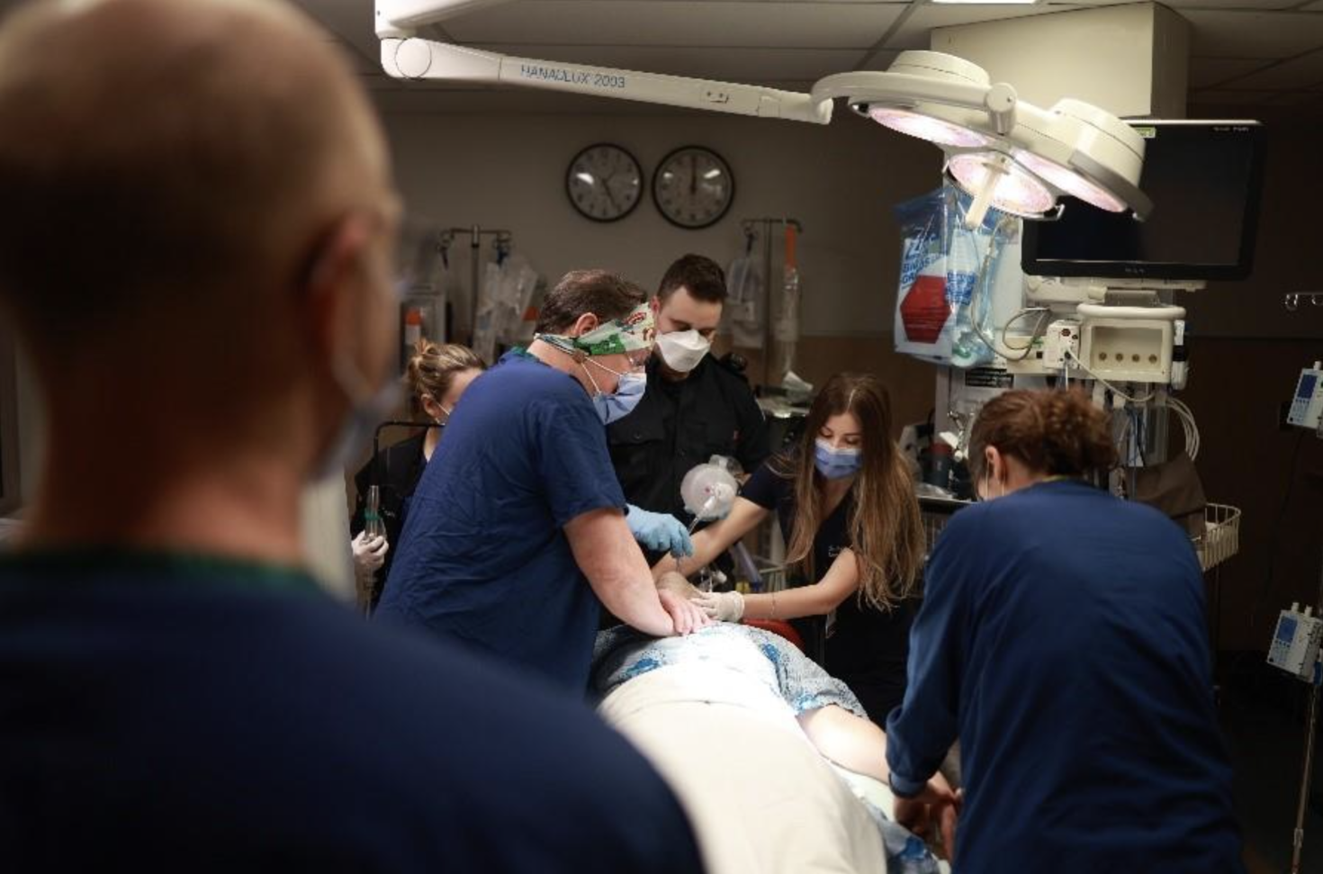 a few doctors are in an emergency room