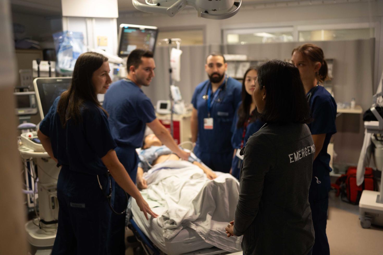doctor teaching residents 