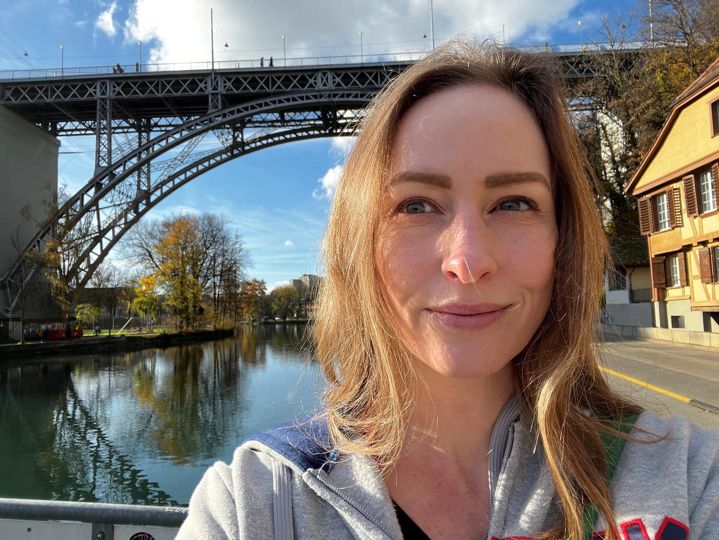 Dr. Meghan McConnell in front of a bridge
