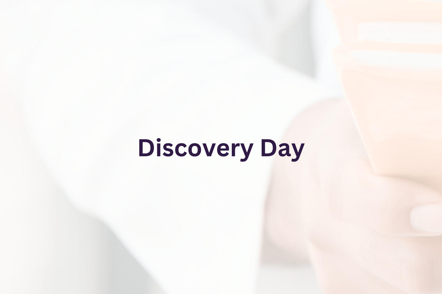 The words "Discovery Day" overlaid on the hands of health professional