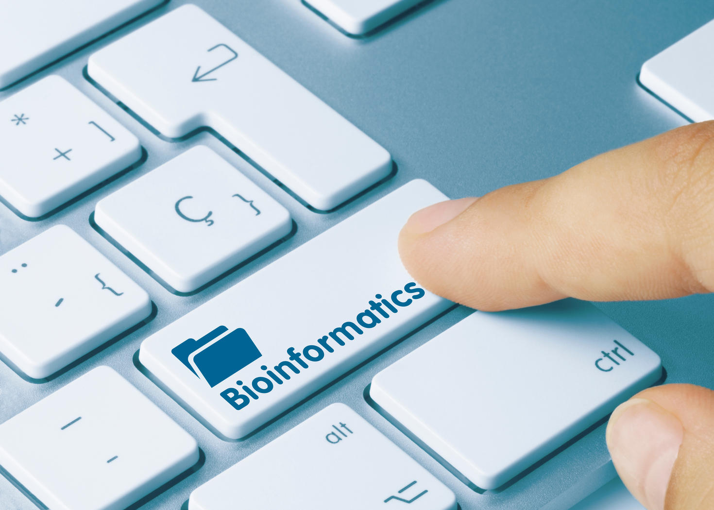 Person pressing enter key on a keyboard