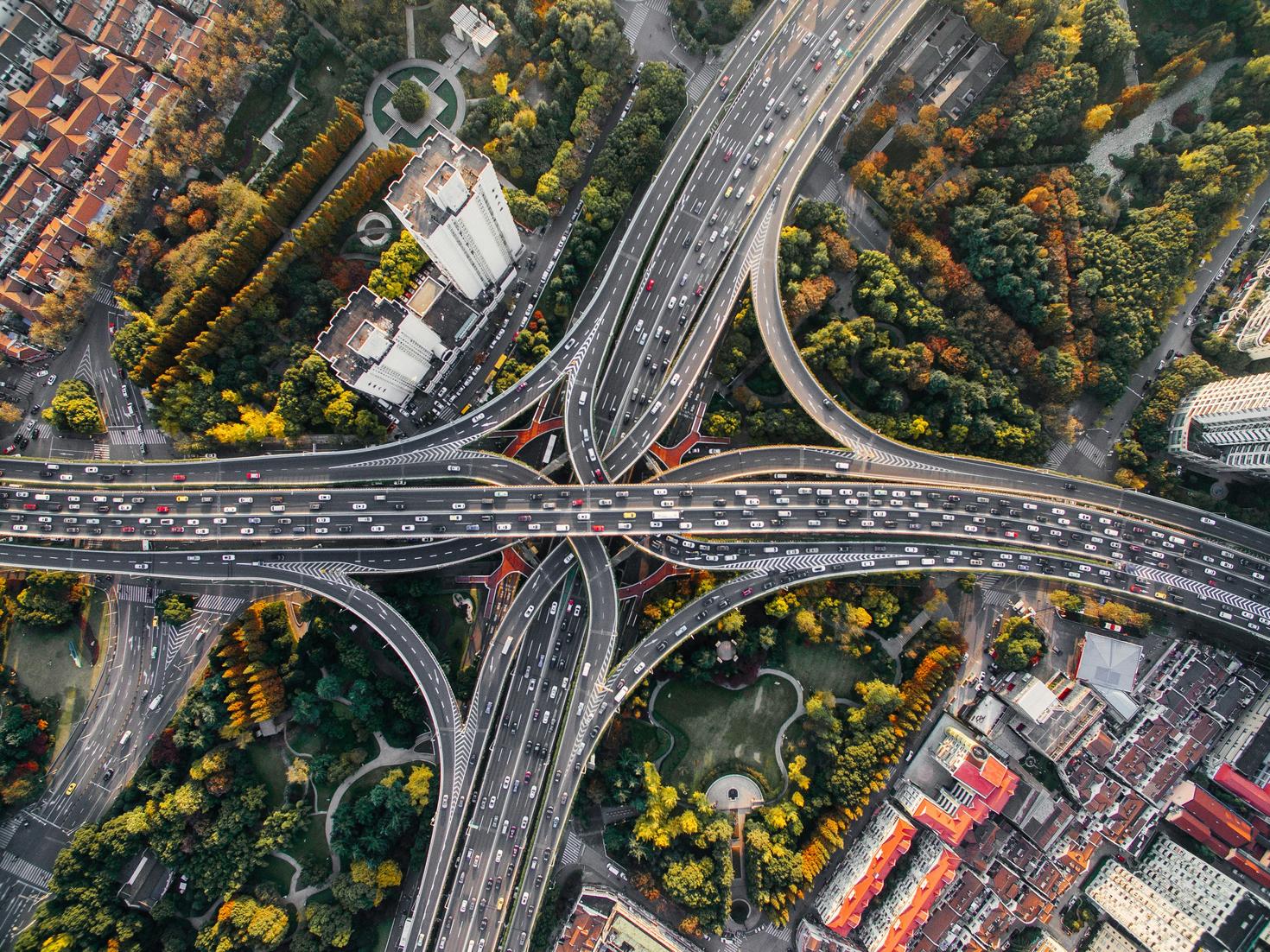 Aerial view of an urban landscape, illustrating environmental and community factors that shape population health