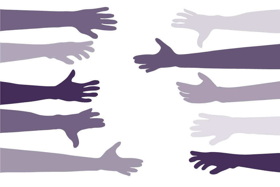 Hands reaching out to show support for each other 