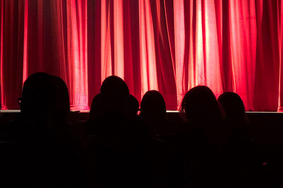 auditorium with red velvet curtain