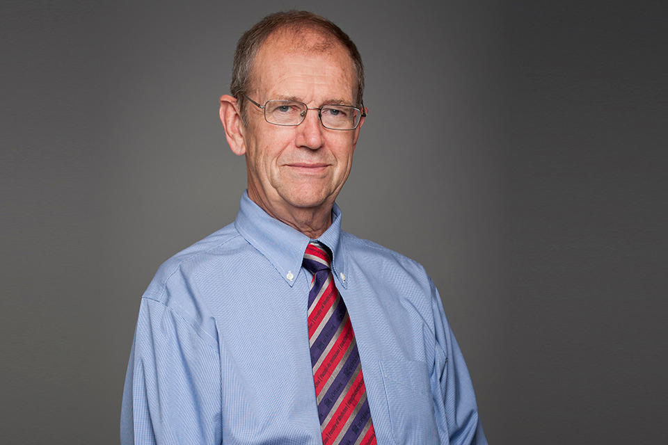 Headshot of Dr. Tugwell