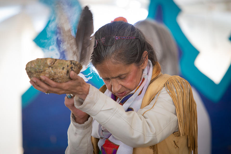 Algonquin Elder Annie Smith St-Georges begins the celebration with a blessing. 
