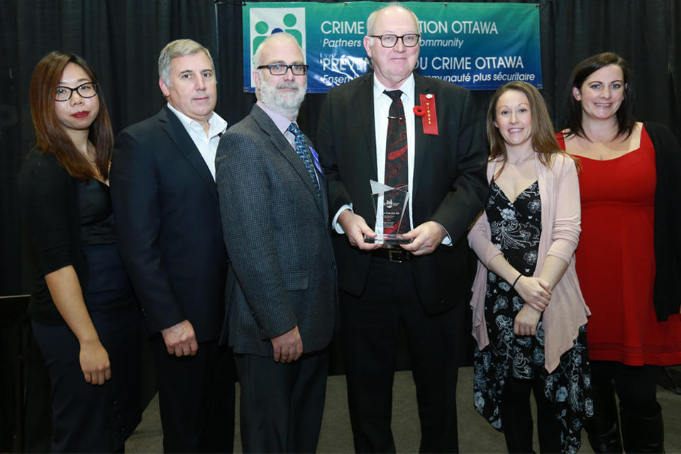 Fedoroff receives his award from Crime Prevention Ottawa at a ceremony on Monday, November 5 at City Hall.