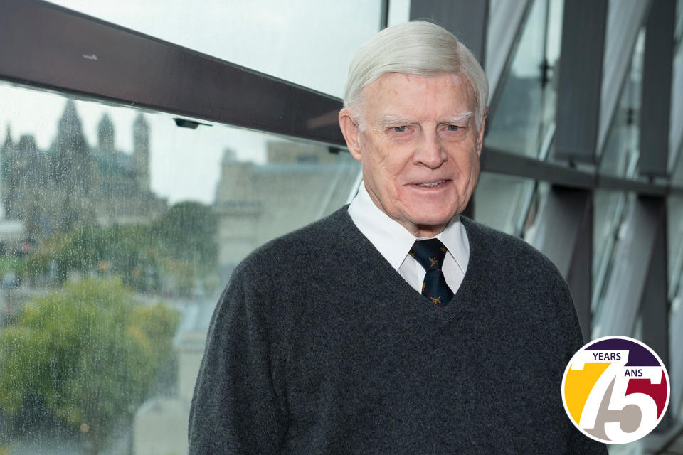 Photo of Dr. Hugh Robertson in the ballroom at the Shaw Centre