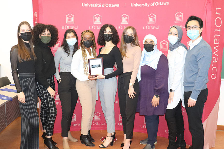 The Translational and Molecular Medicine Student Association posing as a group